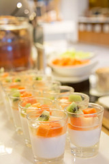  panacotta with mixed fresh fruit in glass