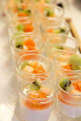 panacotta with mixed fresh fruit in glass