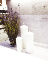 kitchen interior with white candle and lavender.