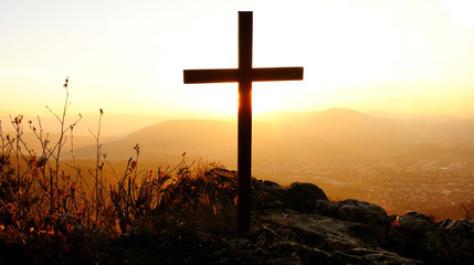 Holy Cross Standing in Mountain Landscape Scenery at Sunset Light
