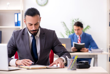 Two male colleagues in the office 