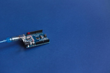 Arduino Uno boards for programming education development platform connected to PC with a USB cable. Micro controller. Technology. Electronic computing machine. Concept