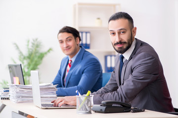 Two male colleagues in the office 