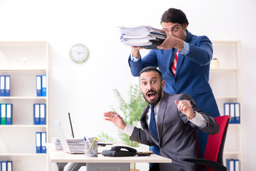 Two male colleagues in the office 
