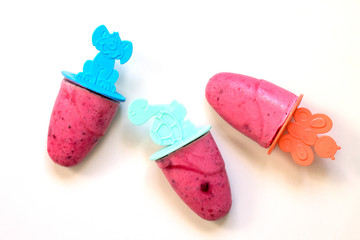 Homemade for kids Fresh fruit berry ice cream isolated on white background.