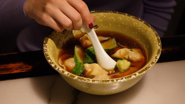 Asian food dampling soup in bowl