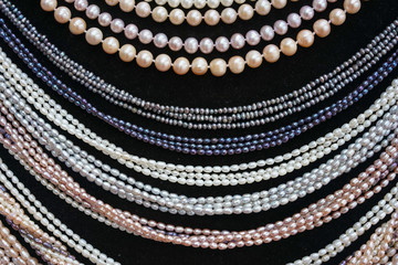Pearl necklace. Lady accessories made from biser pearl. texture and pattern of beautiful pearl necklace for background.