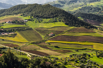 Cultivated fields from above and view over the highlands in Sicily, south Italy