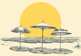 Beach and sea panorama. Umbrellas on the beach by the sea