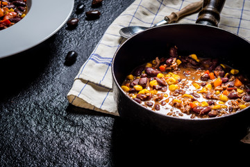 Chili corn carne on stone table