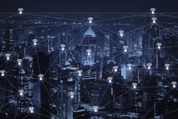 The abstract image of wireless network and wifi connection technology concept with bangkok city background at night in Thailand