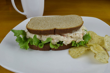 tuna fish sandwich  on wheat bread