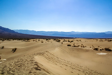 Fototapeta na wymiar Sand Dunes, Mysterious and Amazing Landscape in Haze, Death Valley, California