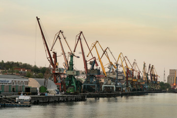 river port and many cargo cranes