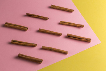 geometric pattern is made of cinnamons. flat lay