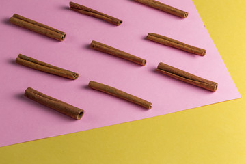 a set of ingredients for dessert on the pink and yellow background. close up photo