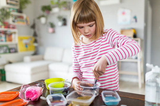 Little Girl Making Homemade Slime Toy