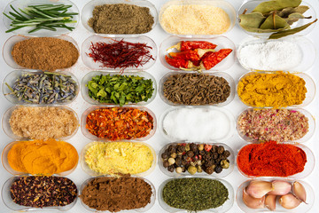 Collection of spices in small bowls