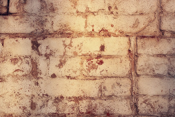 shabby brick wall street