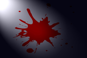red blood stain in the darkness illuminated by spotlight