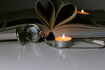 book pocket watch candles