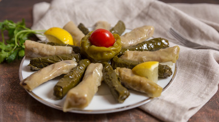 traditional turkish food with olive oil leaves, cabbage and stuffed peppers