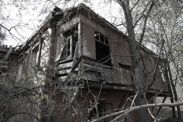 Fototapeta na wymiar abandoned ruin house, wooden architecture, debris, housing wreck