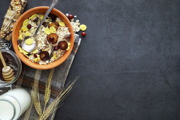 Healthy breakfast. Muesli from cereals with milk berries.