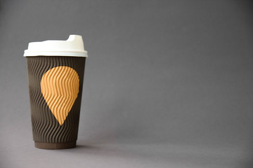 Cup of coffee on grey background. Art soft focus