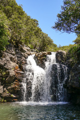 Fototapeta na wymiar Waterfall in Madeira in a summer sunny day with clear blue sky