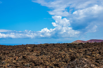 Landscape of volcanoes and solidified lava in Timanfaya national park