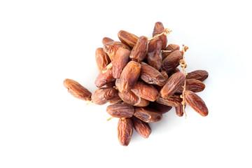 Creative layout made of dried date isolated on white background