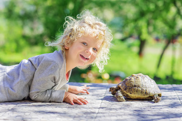 lovely boy with turtle