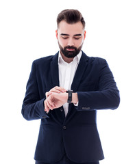 businessman looking at his watch isolated on white