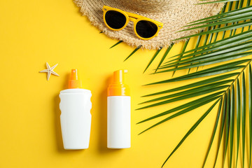 Summer vacation composition on yellow background. Space for text, top view