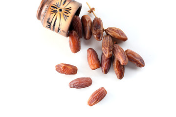 Creative layout made of dried date isolated on white background