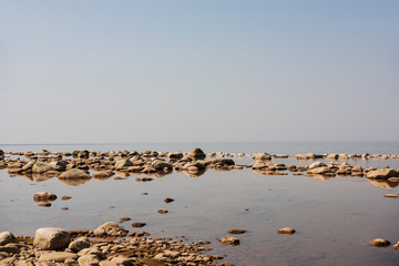 Stones balance on the beach. Place on Latvian coasts called Veczemju klintis
