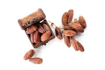 Creative layout made of dried date isolated on white background