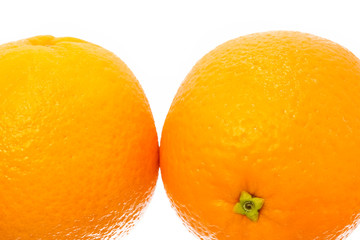 beautiful orange juicy orange on a white background