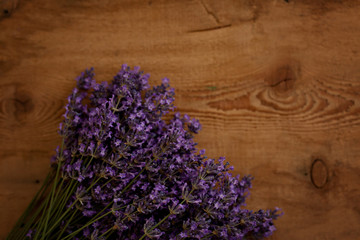Lavender bouquet on old wooden background