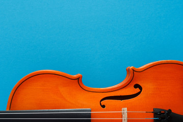 Classiacal music festival poster with violin on blue background