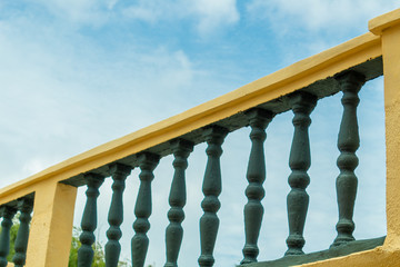 Terrace columns with a cloudy blue sky background