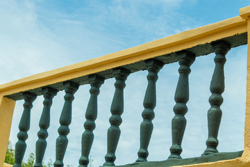 Terrace columns with a cloudy blue sky background