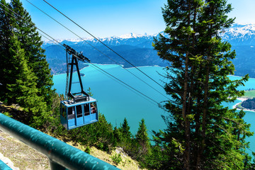 View on the Lake Walchensee from the top of Herzogstand, people can reach it with Herzogstand Cable Car, Bavaria, Germany