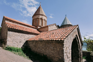 Fototapeta premium Ananuri church and fortress in Georgia in sunny day