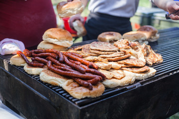 freshly grilled sausages at street food markets