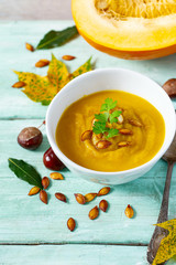 pumpkin soup on wooden surface