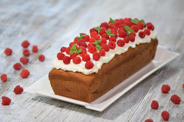 Homemade Raspberry Pound Cake decorated with Raspberry