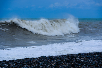 Stormy sea waves breaking near the coast