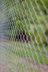 Abstract image of a mesh fence.